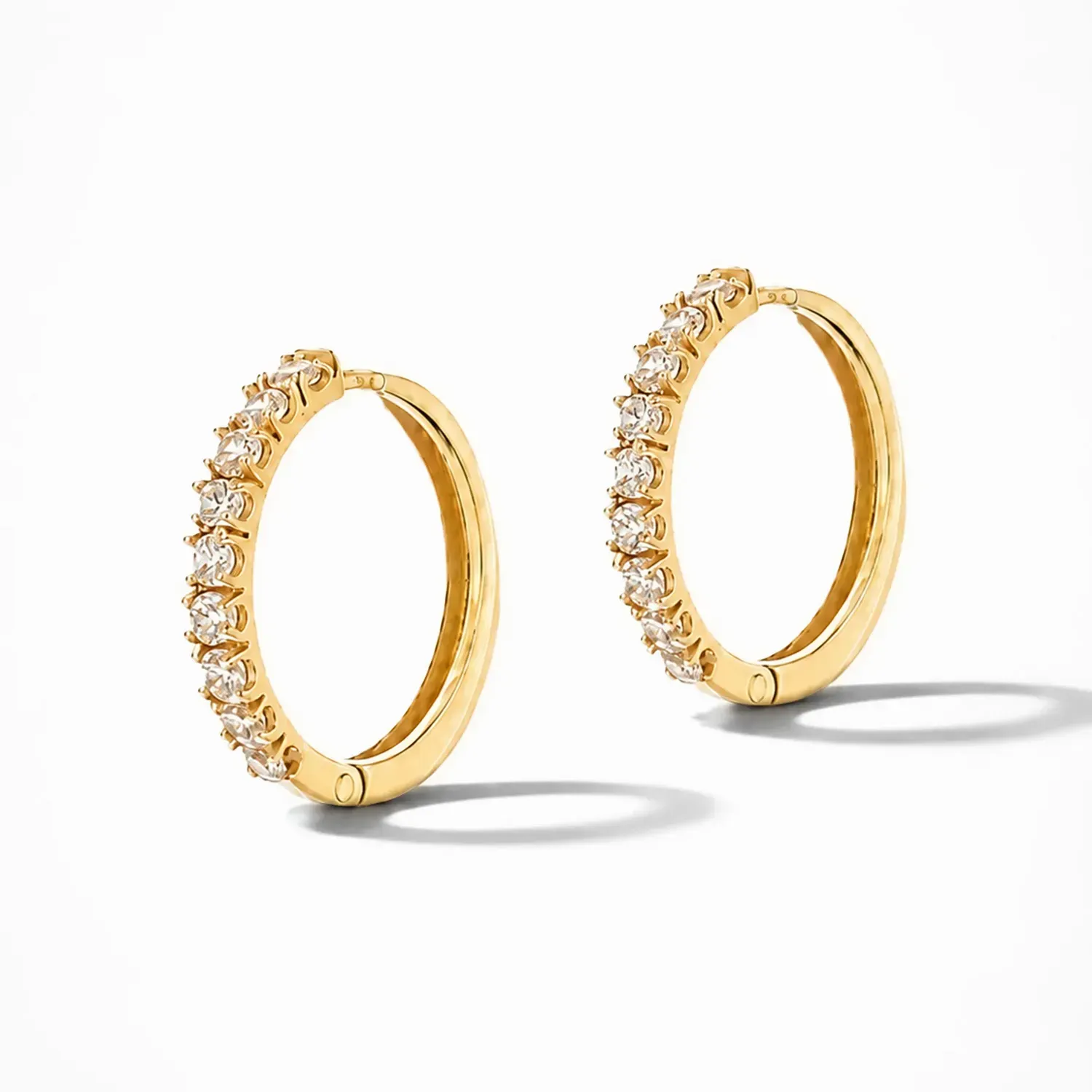 Gouden Oorbellen Huggy Loops Zirkonia Copain Medium